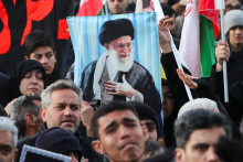 People react as they gather at the Enghelab Square, after Iran&lsquo;s Supreme Leader Ayatollah Ali Khamenei was killed in Israeli and U.S. strikes on Saturday, in Tehran, Iran, March 1, 2026. Majid Asgaripour/WANA (West Asia News Agency) via REUTERS ATTENTION EDITORS - THIS PICTURE WAS PROVIDED BY A THIRD PARTY FOTO: Majid Asgaripour
