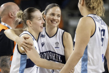 Na sn&iacute;mke slovensk&eacute; basketbalistky zľava Nikola Dud&aacute;&scaron;ov&aacute;, Ter&eacute;zia P&aacute;lenikov&aacute; a Alica Moravč&iacute;kov&aacute; sa raduj&uacute; po v&iacute;ťazstve nad Cyprusom 14. marca 2026 v Bratislave. FOTO: TASR/Martin Baumann