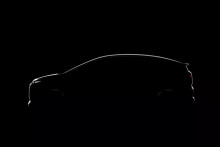 Audi A2 e-tron sa odhaľuje na prvej sn&iacute;mke pod r&uacute;&scaron;kom tmy.