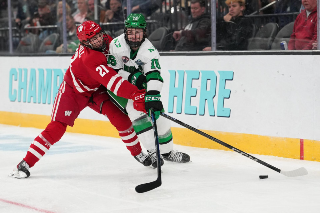Ryan Botterill (21) a Keaton Verhoeff. FOTO: Reuters