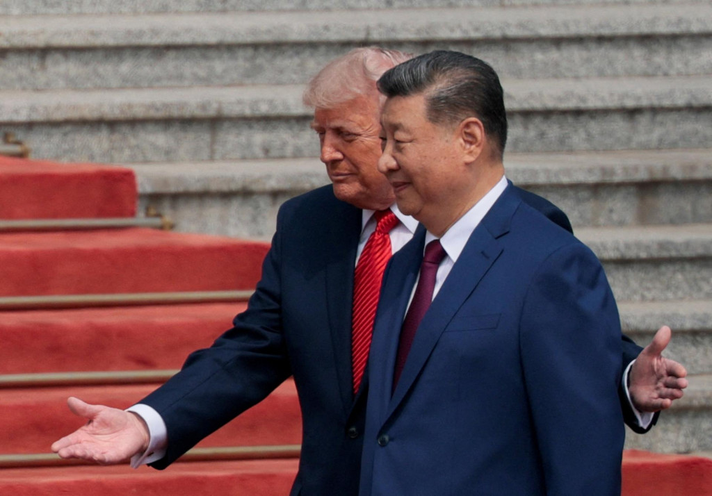 Povinnou jazdou pre Peking bolo popracovať s egom zn&aacute;meho milovn&iacute;ka červen&yacute;ch kobercov ok&aacute;zal&yacute;m prijat&iacute;m. FOTO: Reuters/Evan Vucci