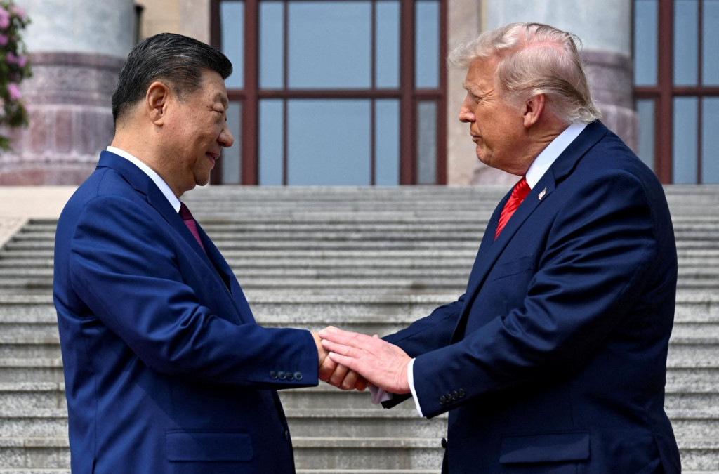 Americk&aacute; prezident Donald Trump a č&iacute;nsky prezident Si Ťin-pching. FOTO: REUTERS