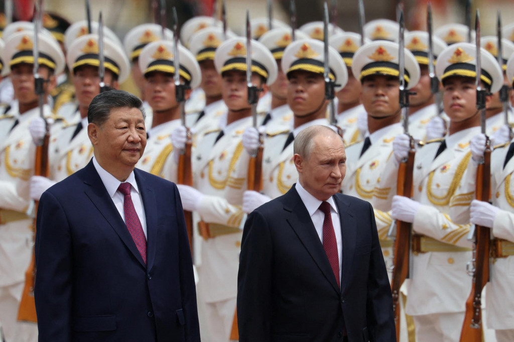Rusk&yacute; prezident Vladimir Putin a č&iacute;nsky prezident Si Ťin-pching FOTO: REUTERS