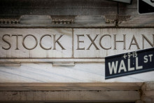 Akciov&eacute; indexy na Wall Street post&uacute;pili koncom m&aacute;ja na nov&eacute; hitorick&eacute; maxim&aacute;. FOTO: REUTERS