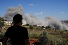 Izraelsk&iacute; predstavitelia vr&aacute;tane predsedu vl&aacute;dy opakovane varovali, že Izrael zasiahne Dah&iacute;ju, ak bude Hizball&aacute;h &uacute;točiť na izraelsk&eacute; komunity na severe. FOTO: REUTERS