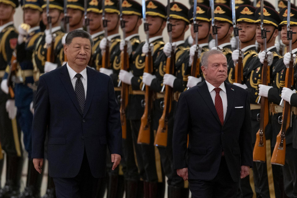 Č&iacute;nsky prezident Si Ťin-pching (vľavo) a Jord&aacute;nsky kr&aacute;ľ Abdall&aacute;h II. FOTO: TASR/AP